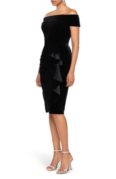 Slip into this little black dress with confidence knowing that it's stunning with an off-the-shoulder neck and a frilly ruffle down the skirt. 38 1/2" center front length (size 8) Off-the-shoulder neck Short sleeves Lined 90% polyester, 10% spandex Dry clean Imported Elegant Christmas Dresses Women, Elegant Cocktail Dress Party Classy Knee Length, Cocktail Dresses Classy, Elegant Cocktail Dress Party, Cross Front Dress, Cocktail Dress Classy, Elegant Cocktail Dress, Black Skater Skirts, Christmas Dress Women