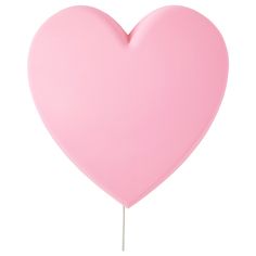 a pink heart shaped lollipop on a stick