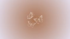 three butterflies flying in the air on a light colored background