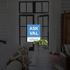 a bedroom with an open window and the words ask vall in blue over it