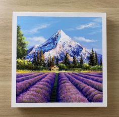 a painting of a lavender field with a mountain in the background