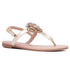 Bold blooms take center stage with the Ailis sandal, where gemstones illuminate the dimensional floral accents for a touch of dazzling elegance. The flat T-strap silhouette ensures comfort and ease, making it perfect for all-day wear. Ideal for adding a pop of glamour to casual or dressy outfits, the Ailis sandal combines style and practicality effortlessly. Step out with confidence and let your footwear make a statement with its vibrant, eye-catching floral design. Olivia Miller, Outdoor Sandals, Faux Leather Heels, Open Toe Shoes, Dressy Outfits, Center Stage, Casual Sandals, T Strap, Thong Sandals