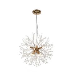 an elegant chandelier with white and gold accents on the top, hanging from a ceiling