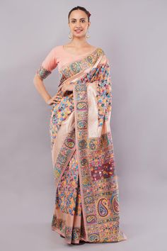 Experience the luxury of our Exclusive Peach Kashmiri Modal Weaving Saree. Made specially for confident and stylish women, this saree features a beautiful border, rich pallu and comes with a blouse piece. Perfect for weddings and special occasions, this saree will make you stand out in the USA and Australia. The unstitched blouse can be customized upto 44 inches. Do Note: All the accessories shown are for styling purpose only. Slight color variation may occur due to photographic reasons. Fall an Drapping Saree, Peach Saree, Lace Saree, Purple Saree, Orange Saree, Indian Designer Sarees, Peach Blouse, Indian Saree Blouse, Readymade Saree