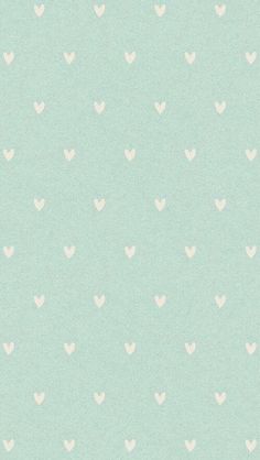 a light green background with white hearts on it