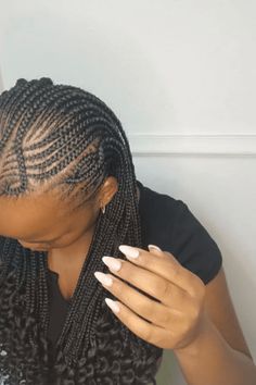 This stylish hairstyle features carefully braided cornrows that start at the front of the head and get thinner toward the back, demonstrating outstanding skill and care in how it was done. The braids come together into lots of twists or box braids, adding bumps and fullness, making a smooth change from the neat cornrows to the - Click to see more of Get Your Hair Game on Point with These 25 Snoopy-Inspired Hairstyles! and follow us for more hairstyle ideas. // Photo Credit: Instagram @efem_spa Box Braids