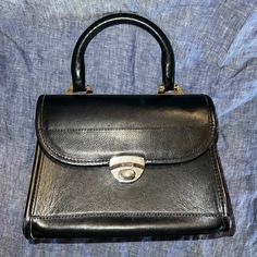 French Luggage Company Blackleather Handbag In Great Vintage Condition. Rare Handbag From French Luggage Company. This Brand Is Most Known For Being The First American Company To Manufacture Licensed Lv Luggage And Bags, And The Quality Is The Same For This Bag. This Handbag Is Made From Extremely High Quality Leather, And Hardware Featuring The French Luggage Company Logos, Does Have Slight Tarnish From Age. Interior Of The Bag Includes Thick Lining With Logos As Well. Really Good Condition. Missing The Shoulder Strap, Lost Awhile Ago. French Handbags, Lv Luggage, Rare Handbags, Company Logos, Bags Vintage, Purse Brands, The First Americans, Watch Collection, Vintage French