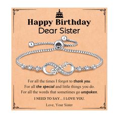 a birthday card with a silver bracelet on it