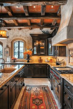 a large kitchen with wooden cabinets and an area rug on the floor in front of it