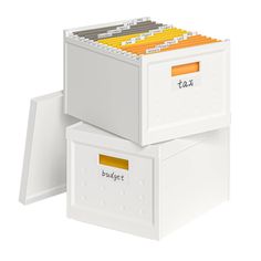 two white file cabinets with yellow labels on the top and bottom, each containing files