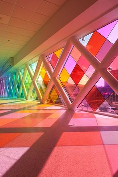 an abstractly colored building with many windows