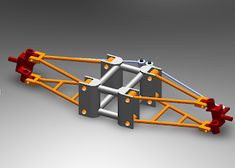 an orange and white structure with metal bars on it's sides, in the middle of a gray background