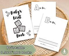 three baby's first abc book printable cards on a basket with the words abc and