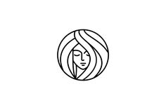 a woman's face in a circle with long hair