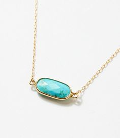 Effortlessly transition from everyday wear to special occasions in this subtle and low-profile genuine turquoise necklace. The gold bezel setting not only enhances the beauty of the turquoise but also adds a luxurious touch to the overall design. Dimensions: 7.5-9.5" adjustable length, pendant size 1 cm Material: 14k gold-filled, lead and nickel-free chain Weight: 0.52oz Lobster clasp closure Handmade in USA Turquoise And Gold Necklace, Floyd Virginia, Turquoise Bar Necklace, Aqua Necklace, Turquoise Bar, Modern Jewellery, Classy Jewelry, Karen Kane, Genuine Turquoise