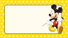 a mickey mouse cartoon character with a yellow polka dot background and a white blank sign