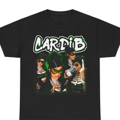 a black t - shirt with the words cardib on it and two women in green makeup