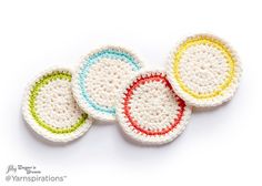 three crocheted coasters are shown on a white surface with four different colors