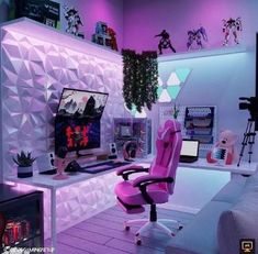 a computer desk with a pink chair in front of it