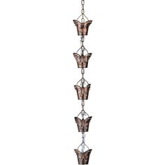 a hanging light fixture with butterflies on it