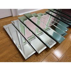 four different colored glass panels on the floor