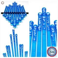 several blue toothbrushes are lined up together