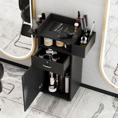 a black vanity table with makeup and cosmetics on it