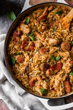 This cajun sausage pasta is made with orzo, chicken, and peppers. It's an easy one-skillet meal perfect for weeknight dinners and meal prepping. This Cajun pasta with sausage recipe takes about 45 minutes to cook. It's reminiscent of jambalaya but made with orzo pasta instead. It's an instant crowd-pleaser. This isn't one of those recipes that claims to be "Cajun" but then lacks flavor. I am a Cajun, so if you're looking for authentic Cajun sausage pasta, this is for you. #cajun #sausage #pasta Cajun Pasta With Sausage, Chicken Orzo Pasta, Chicken And Peppers, Shrimp And Sausage Pasta, Cajun Sausage Pasta, Eat To Perform, Recipe Inspirations, Cajun Sausage, Pasta With Sausage