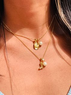 "The ultimate gift necklace for the Coastal or Western cowgirl. 2mm Gold Filled beaded necklace or Cable chain with your choice of a cowgirl boot or hat charm with a pearl. Material: 18 Karat Gold Filled, Hypoallergenic. Tarnish Resistant. Gold-filled does not de-laminate or peel like Gold plated Jewelry nor does it tarnish as readily as silver. Generally speaking, gold filled is better quality and will have a much longer lasting color than plated jewelry. We recommend keeping abrasive chemicals Western Jewelry Gold, Adjustable Charm Necklace With Pearl Charm For Everyday, Adjustable Everyday Charm Necklace With Pearl, Adjustable Gold Charm Necklace With Pearl Chain, Gold Charm Necklace With Pearl Chain And Adjustable Fit, Dainty Pearl Charm Necklace With Initial Pendant, Adjustable Pearl Charm Pendant Necklace, Western Charm Necklace, Coastal Cowgirl Jewelry