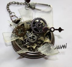 a clock with gears and chains attached to it