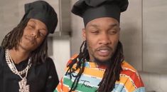 two men with dreadlocks are standing next to each other and one is wearing a chef's hat