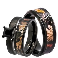 two rings with black ceramic and realtree camo inlays, one has a diamond