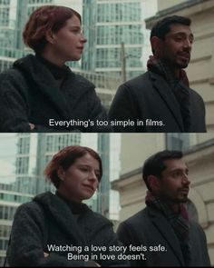 two people standing next to each other in front of tall buildings with the words everything's too simple in films watching a love story feels safe being in love doesn't