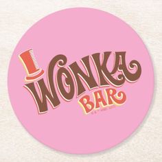 the words wonka bar are in brown and pink letters on a pink circle coaster