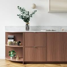 a wooden cabinet with marble top and shelves