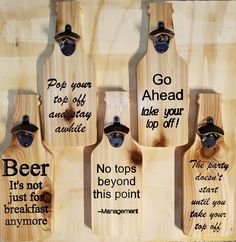 four wooden beer bottle openers with sayings on them