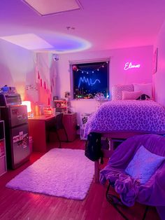 a bedroom with purple and pink lights on the ceiling, rugs and bedding