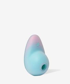 a blue and pink object sitting on top of a white surface