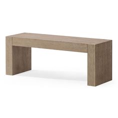 a wooden bench sitting on top of a white floor