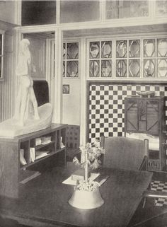 a black and white photo of a living room