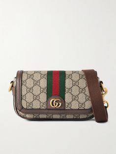 First introduced in 2018, Gucci's 'Ophidia' bag quickly became a fashion staple. This style is crafted from coated-canvas detailed with the label’s signature 'GG' monogram and trimmed with leather and striped webbing. It has an internal zipped pocket for smaller items and an adjustable shoulder strap, should you want to carry it cross-body. Fall In London, Messenger Bag For Men, Gucci Collection, Spain Trip, France Trip, Flat Dress Shoes, Gucci Ophidia, Oversized Hoodies, Gucci Eyewear