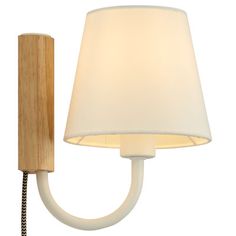 a wall light with a wooden arm and white fabric shade on the back of it