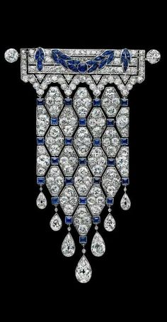 "Specification:- *Diamond Material : Cubic Zirconia  *Diamond Cut : Pear, Princess & Round Cut *Diamond Color : White, Blue *Diamond Clarity : VVS *Brooch Length : 60.00 MM *Brooch Width : 40.00 MM *Making Process: Handmade by our Experienced Staff. *Stamp: Our All Brooch Stamped According to metal Purity (925 SIL/10K/14K/18K). Custom Order:- *We do Accept Custom order. *Buyer can also request customization in listed Items (Charges apply according to required Customization). Customization:- *Buyer can Request change of rhodium color in 925 Silver Jewelry (No additional Charge). *In Gold (10K, 14K, 18K) buyer can change gold color (White, Rose, Yellow). *Buyer can also change CZ Stone Color (No additional Charge). Free Engraving:- *We Provide Free Engraving Service. *If your ordered Jewelry Sapphire Brooch, Bijoux Art Deco, Bijoux Art Nouveau, Wedding Brooch, Diamond Brooch, Art Nouveau Jewelry, Deco Jewelry, Silver Art, Art Deco Diamond