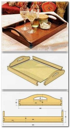 a wooden tray sitting on top of a table next to a glass filled with wine