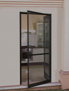 an open glass door in the corner of a room with white walls and tile flooring