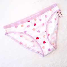 Brand New W/Tags, V.S. Bikini Heart Panty Size: Medium Features: All Over Heart Candy! Purple Logo Waistband Bikini Style Soft & Comfy! Part Of A 2021 Valentine's Day Collection! Please No Trades No Refunds Perfect Gift For Valentine's Day! Ships Same Or Next Day! [Intimates, Lingerie, Rare, Limited Edition Pink, Love Pink, Vintage, Very Sexy, Hipster Boyshort, Cheeky, Cheekster, Tanga] Victoria's Secret Purple Cotton Bottoms, Victoria's Secret Cotton Briefs, Cute White Brief Bottoms, Secret Valentine, Purple Logo, Cute Bras, Sleepwear Women, Victoria's Secret, Pink Girl