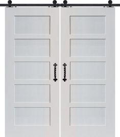 two white double doors with black hardware on each side and one door open to the other