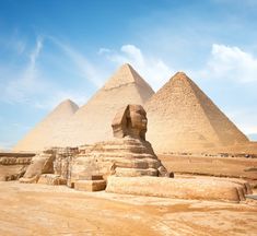 the great sphinx and two pyramids are in front of each other on a sunny day