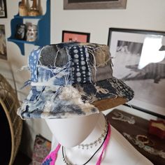 One of a kind denim bucket hat made with recycled denim jeans.  Every hat is unique.  Already machine washed and dryed for optimal distressed look.  Very comfortable on.   Ready to ship Distressed Cotton Retro Hat, Distressed Cotton Hat In Medium Wash, Faded Vintage Hat, Vintage Blue Distressed Hat, Blue Cotton Festival Hat, Faded Cotton Hat Pre-washed, Blue Washed Bucket Hat, Blue Cotton Bucket Hat For Festivals, Faded Pre-washed Cotton Hat