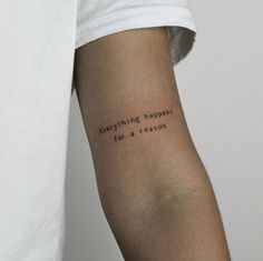 a person with a tattoo on their arm that says everything happens for a reason,